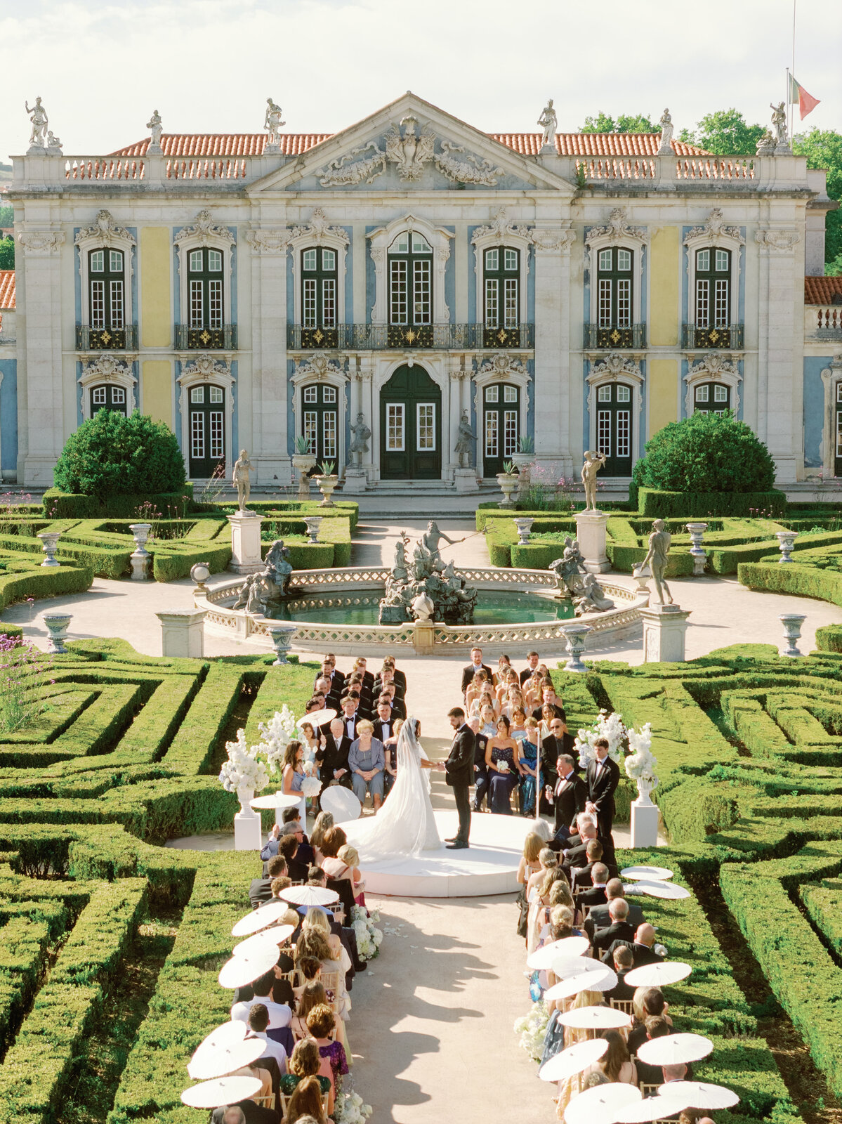 Vertical aerial view of the ceremony aisle and palace