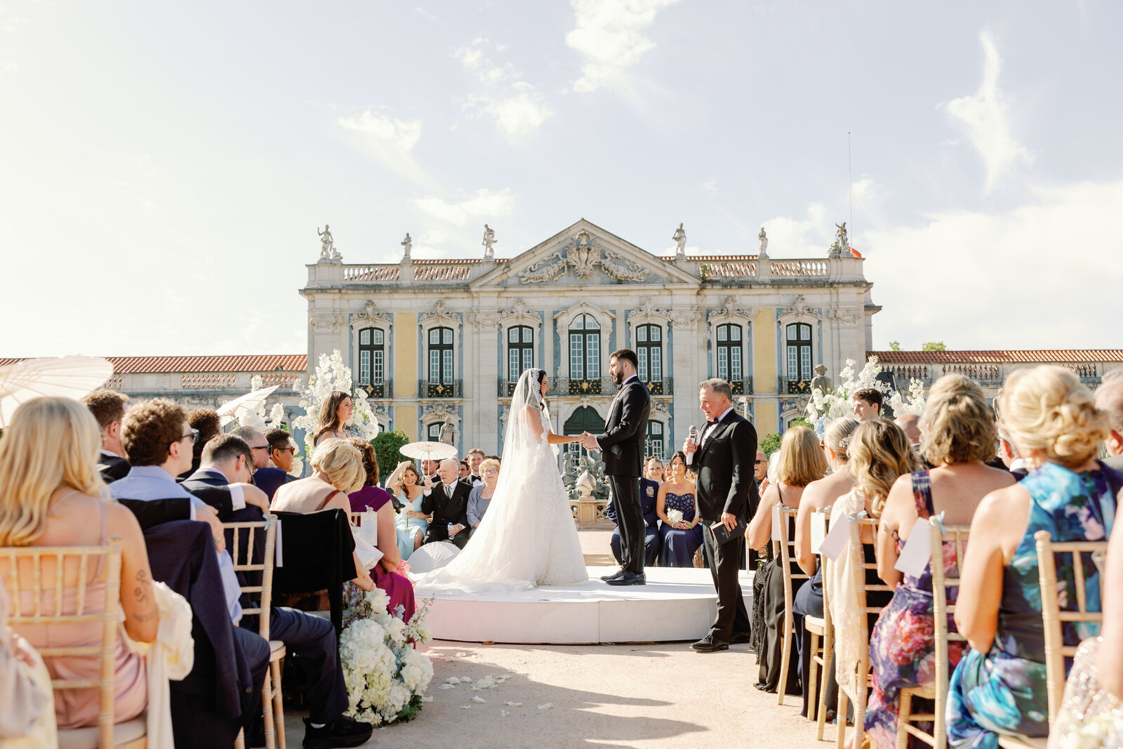 Bride and groom exchanging vows on the round platform