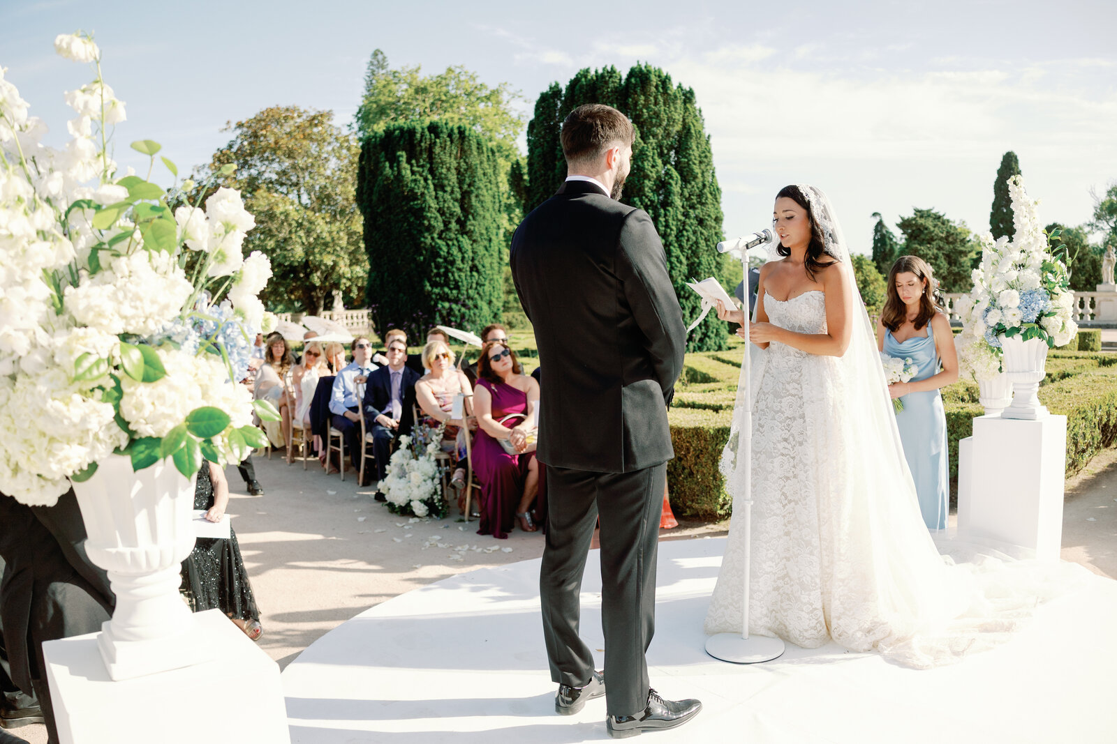 Bride reading her vows at the microphone