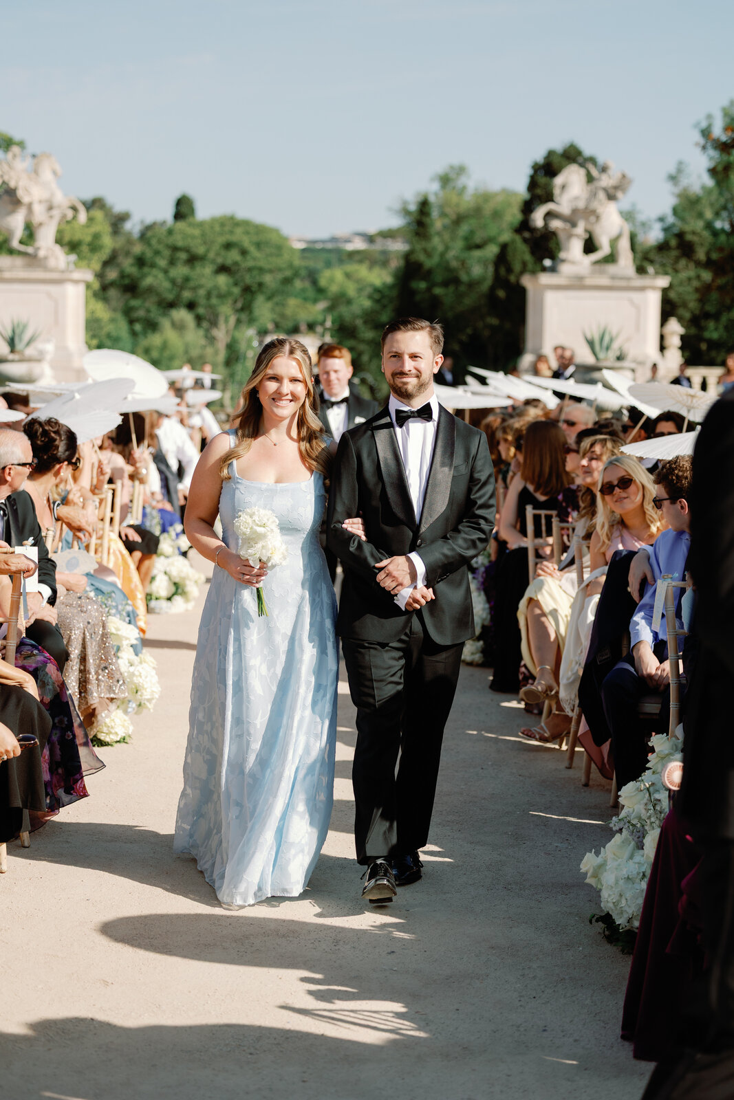 Wedding party couple walking down the aisle