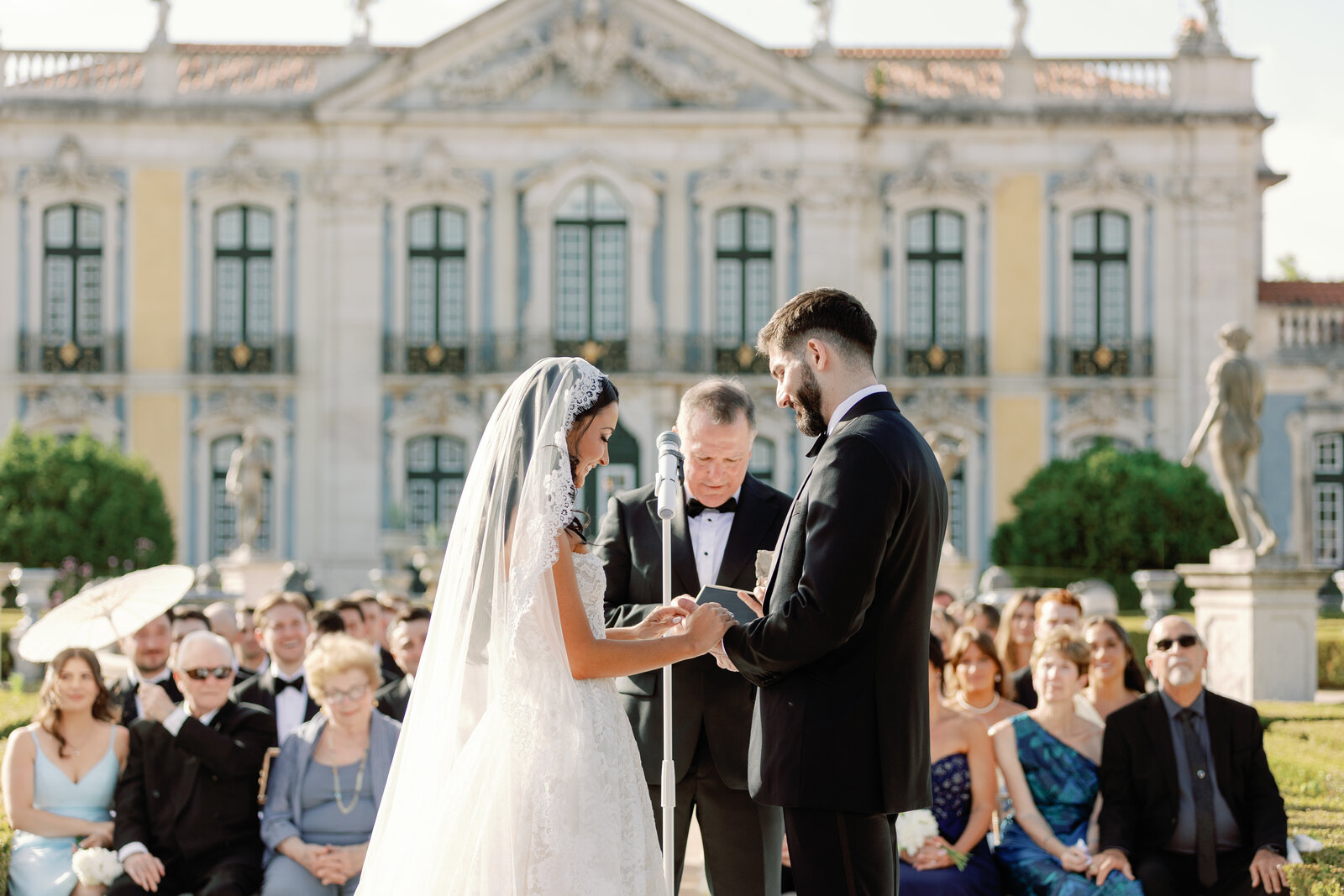 Officiant guiding the couple through the ring exchange