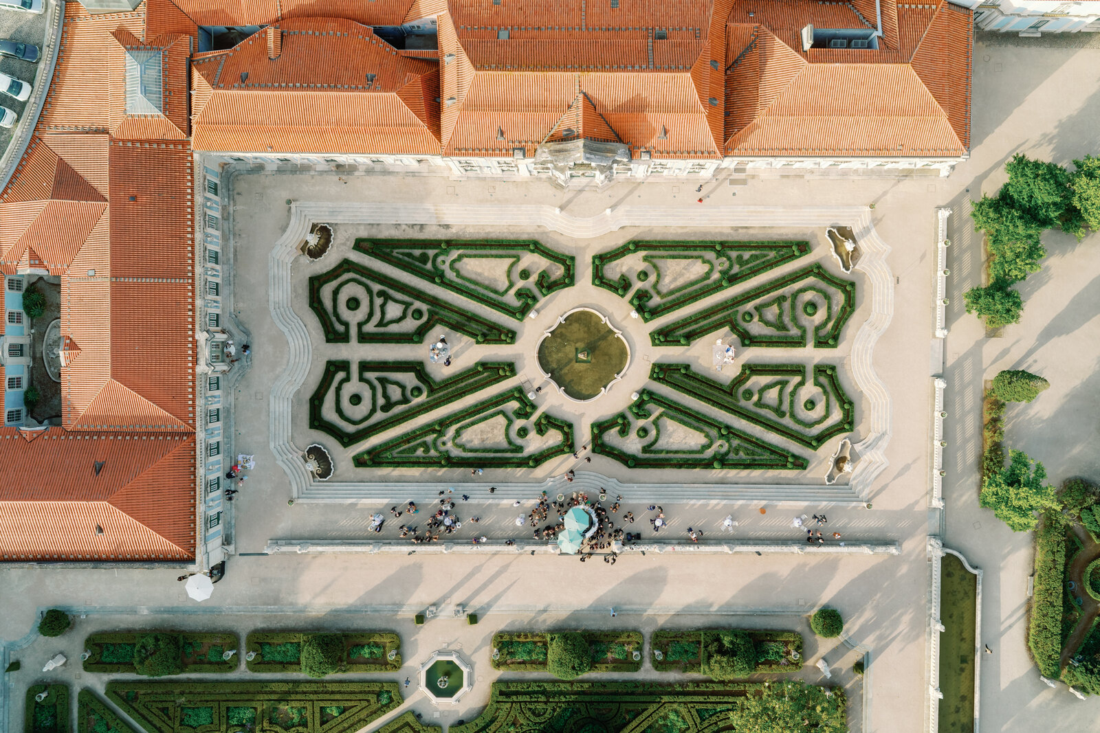 Aerial overview of the palace, gardens, and surrounding town