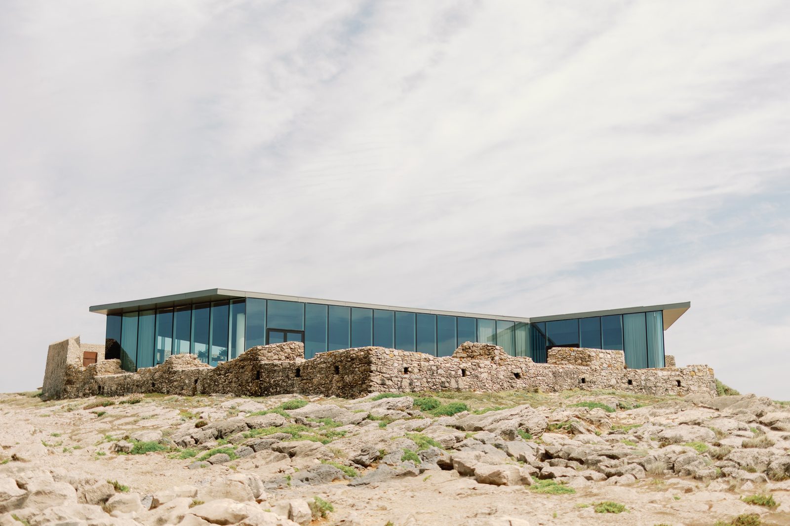 Glass-walled venue perched on the cliff above the Atlantic