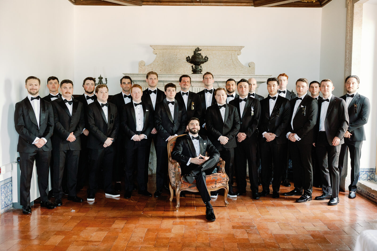 Full groomsmen party portrait in black tuxedos