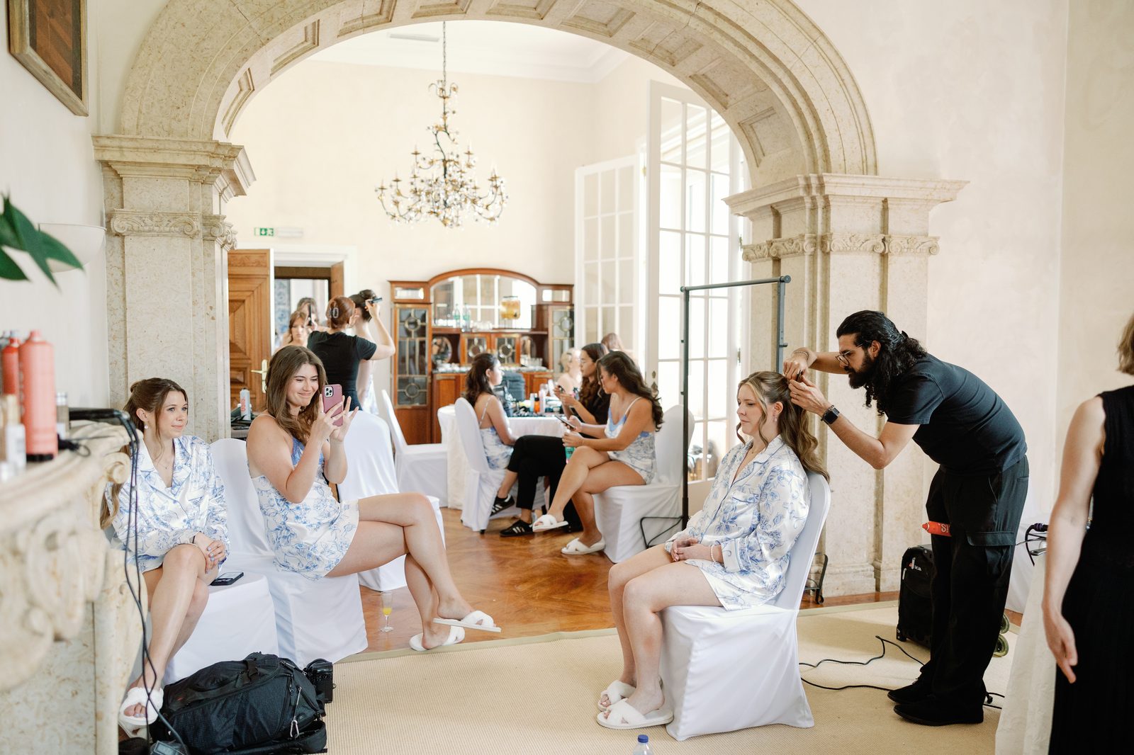 View through the archway of guests getting ready