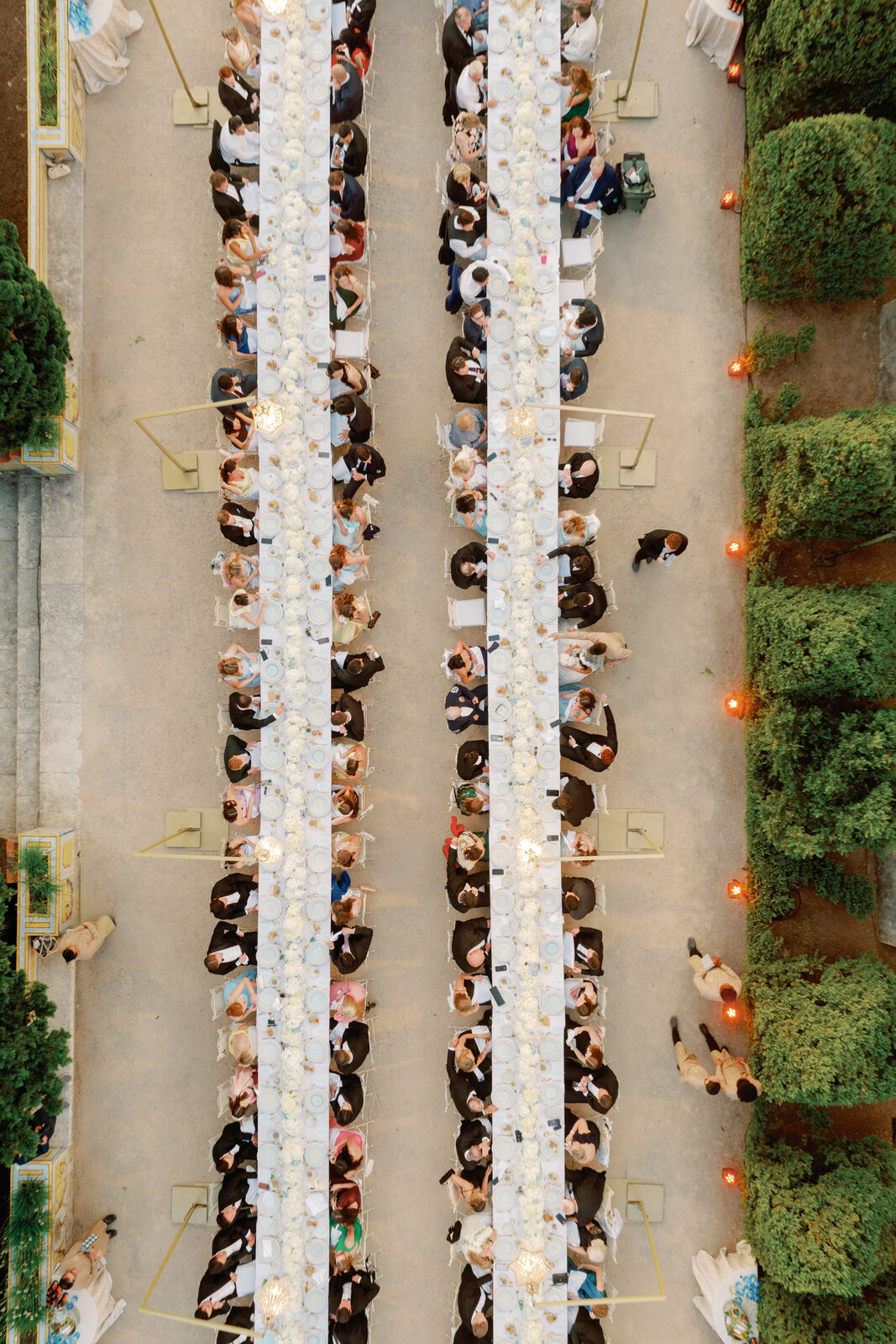 Aerial view of the reception tables lit by string lights