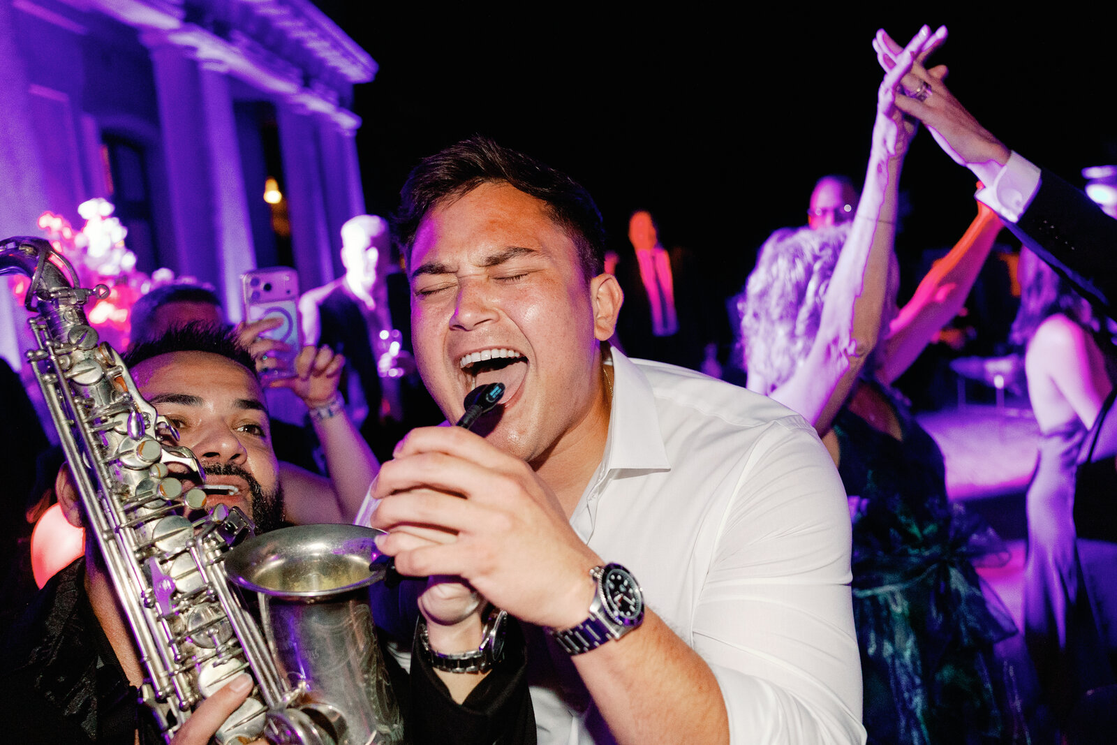 Close-up of the band singer and saxophonist performing
