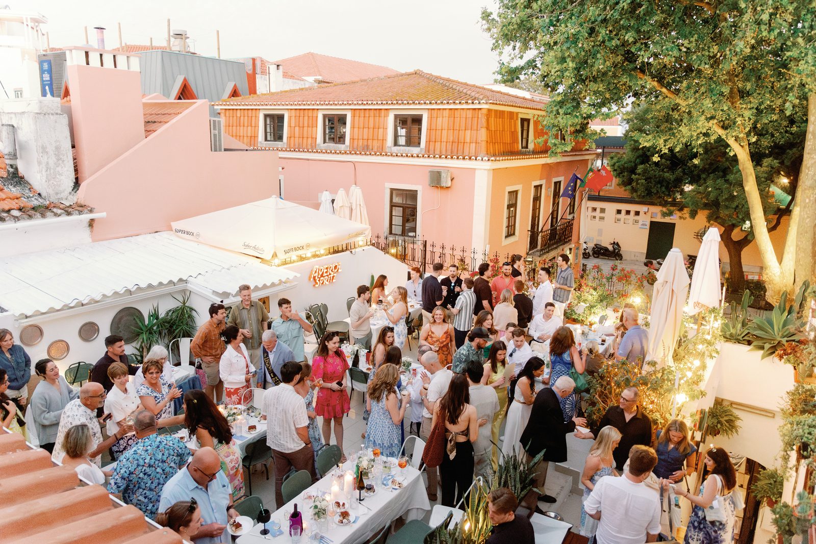 Wide aerial view of the full terrace at sunset