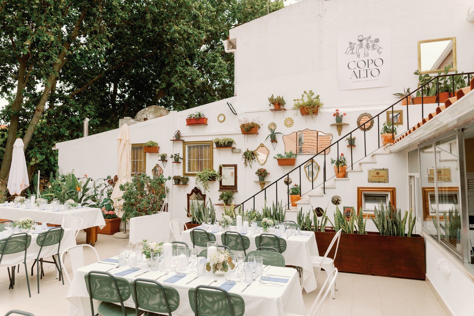 Copo Alto terrace set with tables ahead of the rehearsal dinner