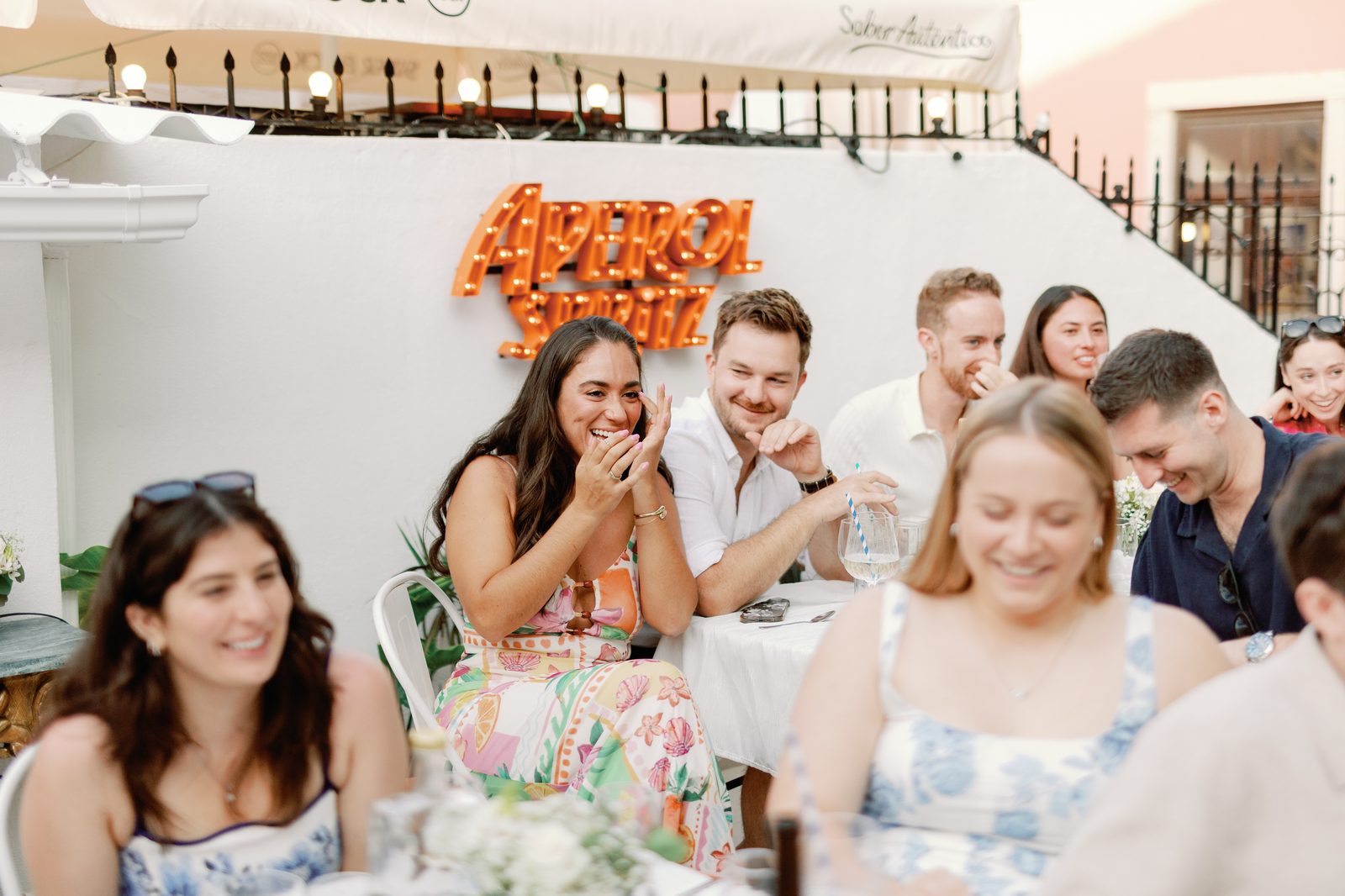 Guest laughing during the toast