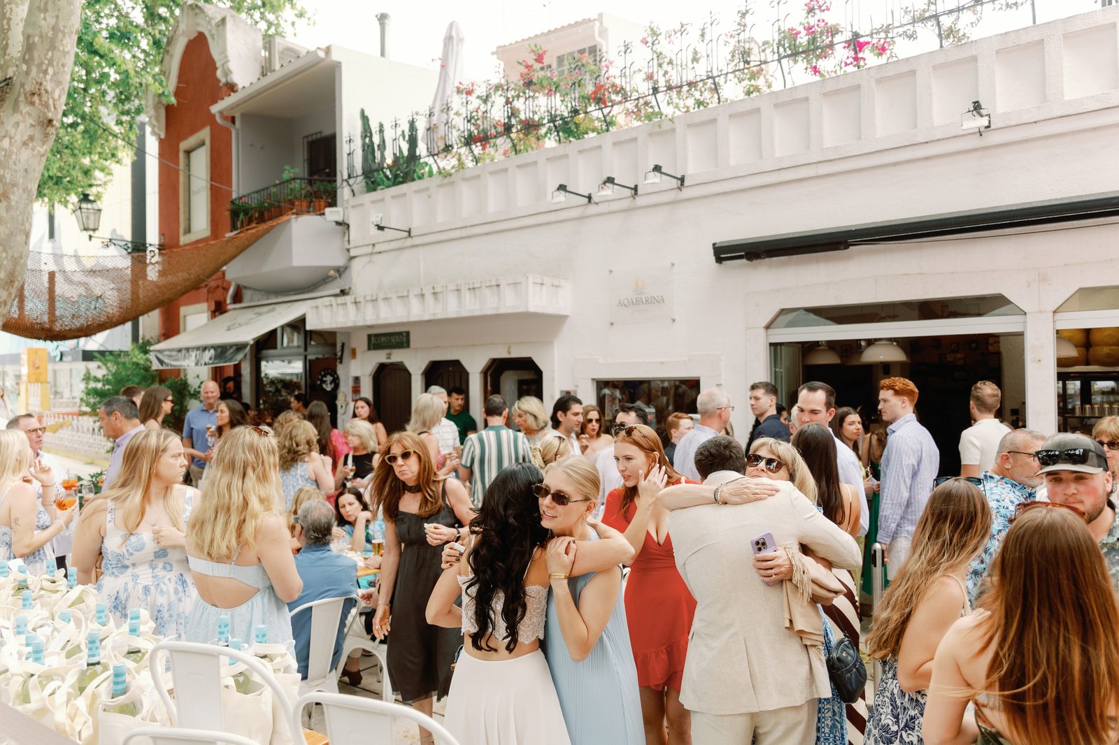 Guests embracing during the celebration